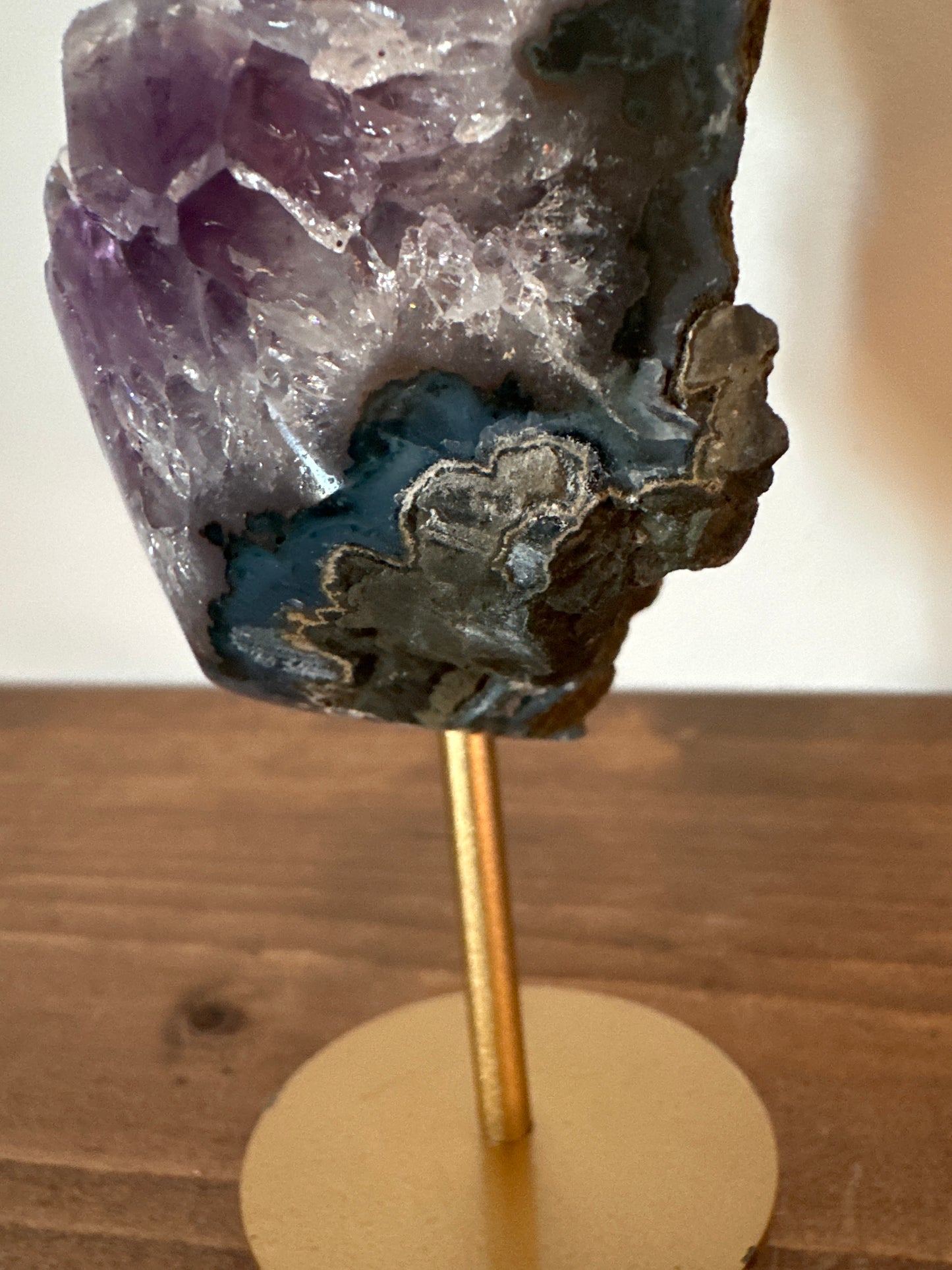 Amethyst on gold stand