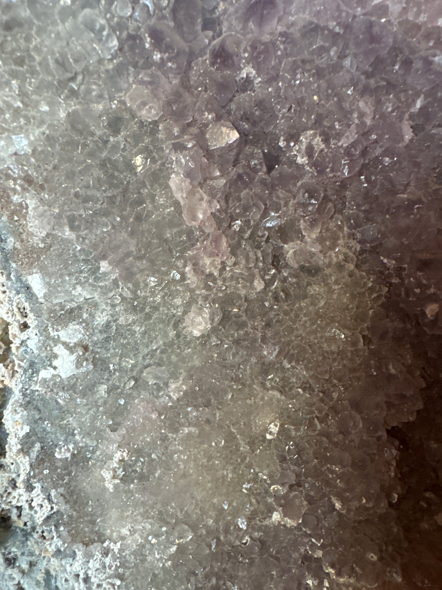 Zeolite on stand. Large pink and blue hues.