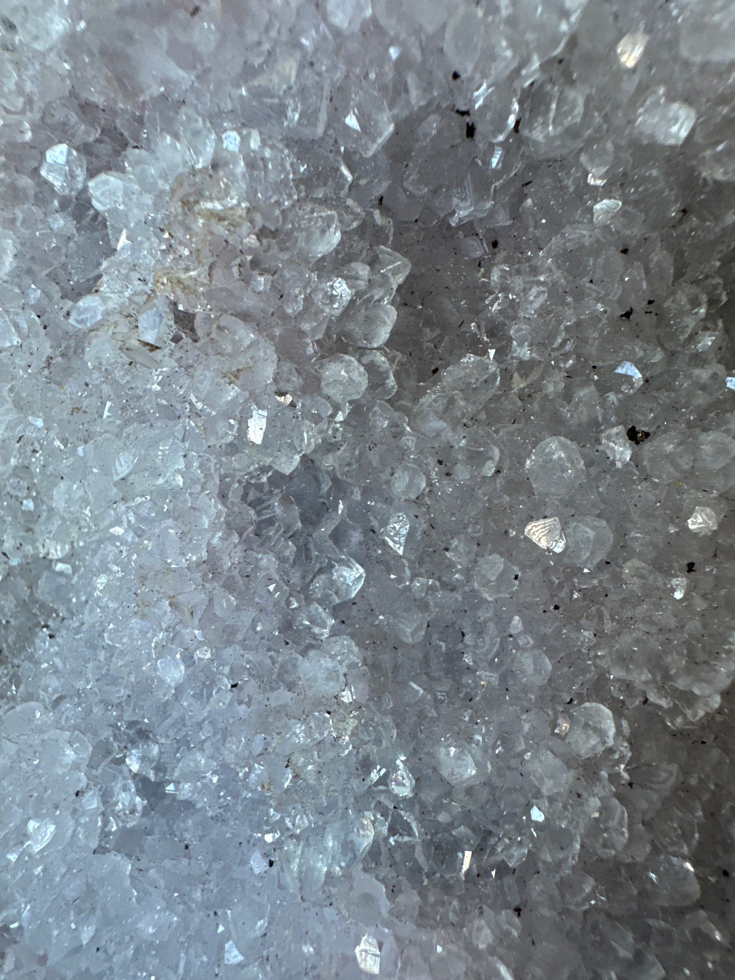 Zeolite with hematite inclusions.