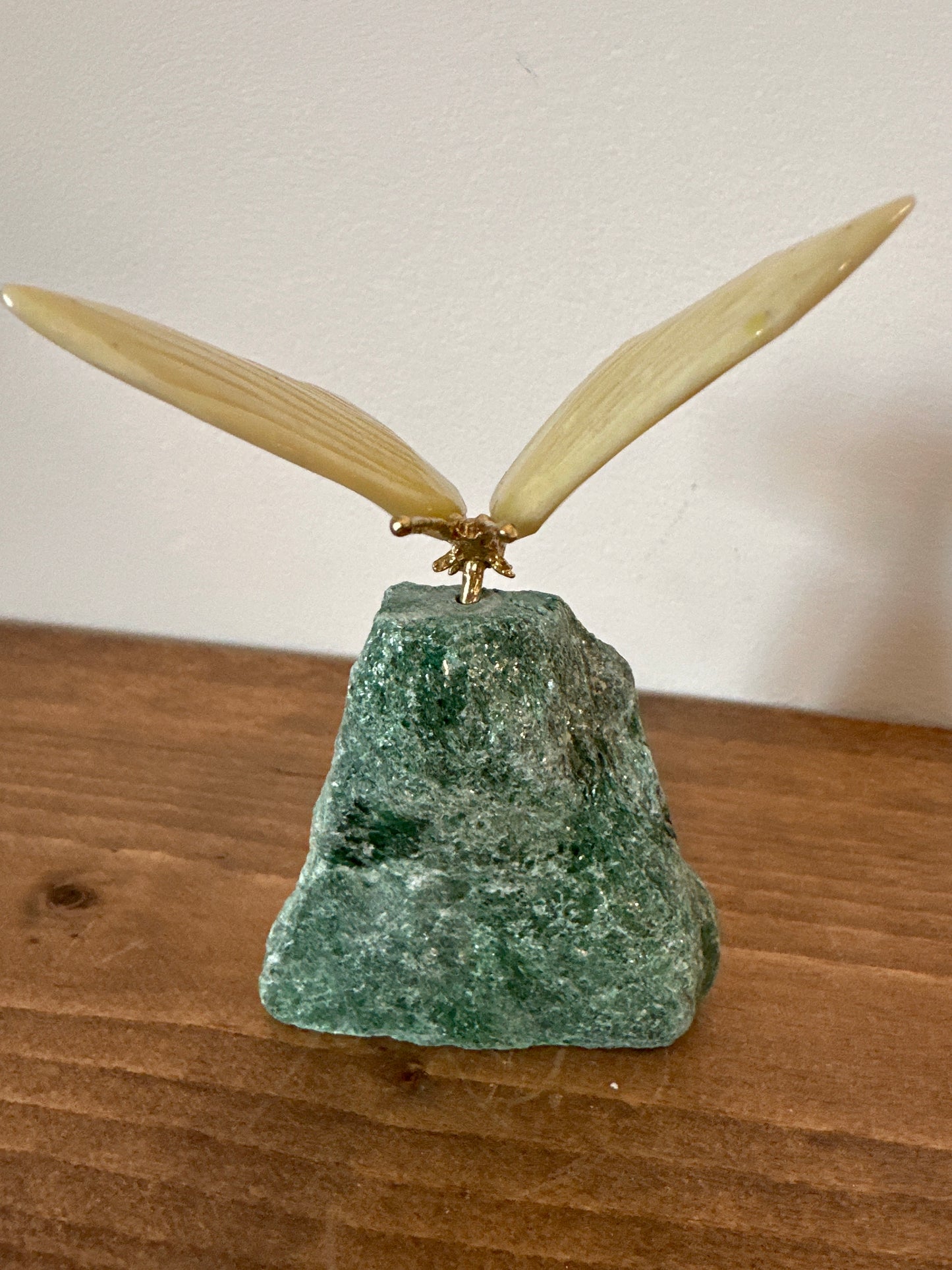 Yellow butterfly on fushsite