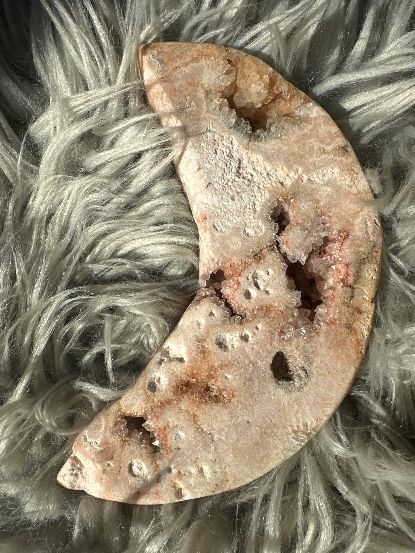 Pink amethyst moon. Lots of crystal pockets.