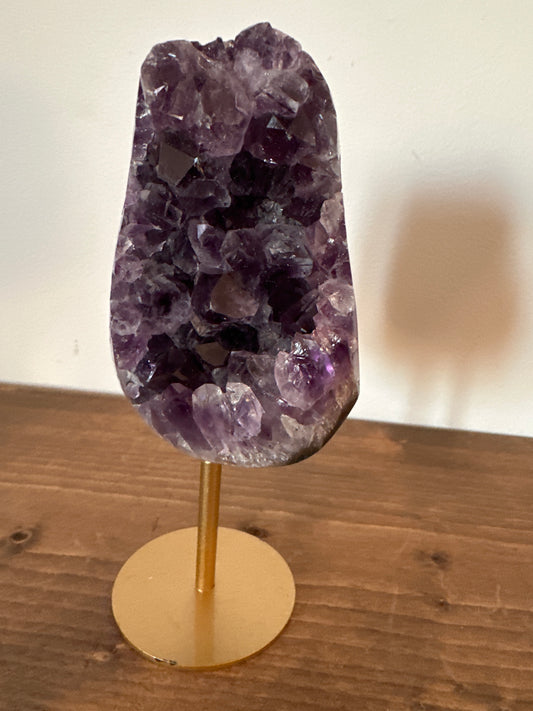 Amethyst on gold stand