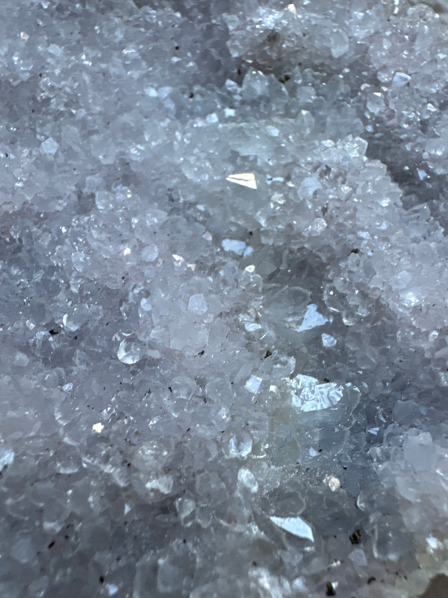 Zeolite with hematite inclusions.