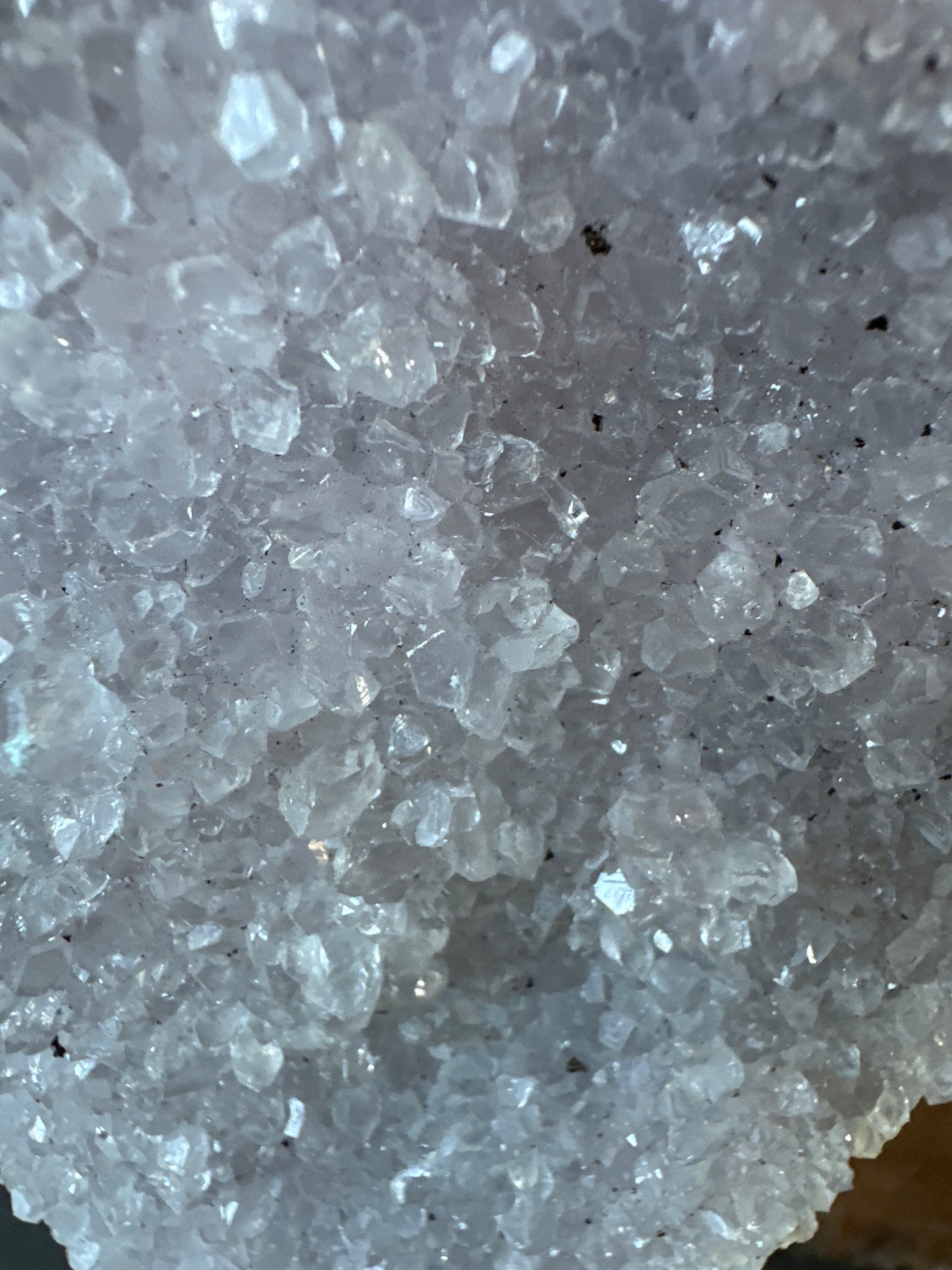 Zeolite with hematite inclusions.