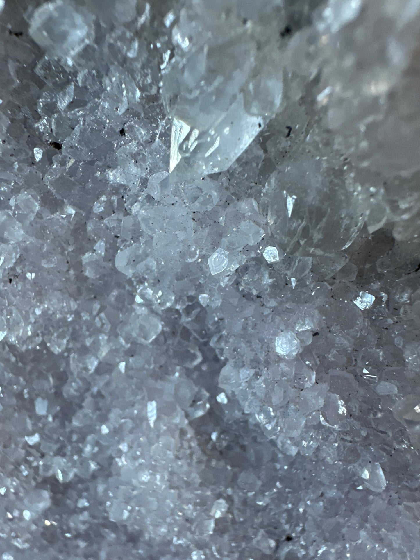Zeolite with hematite inclusions.